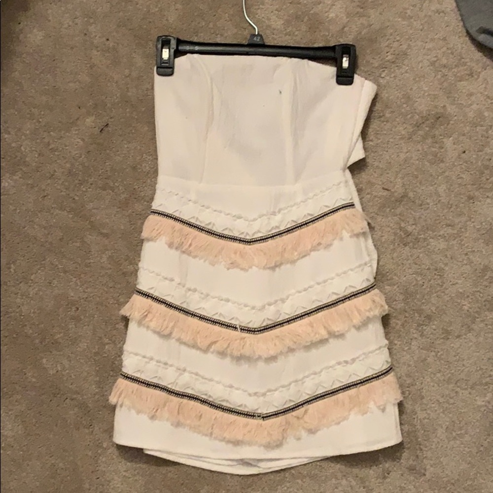 white strapless mini dress with cream fringe